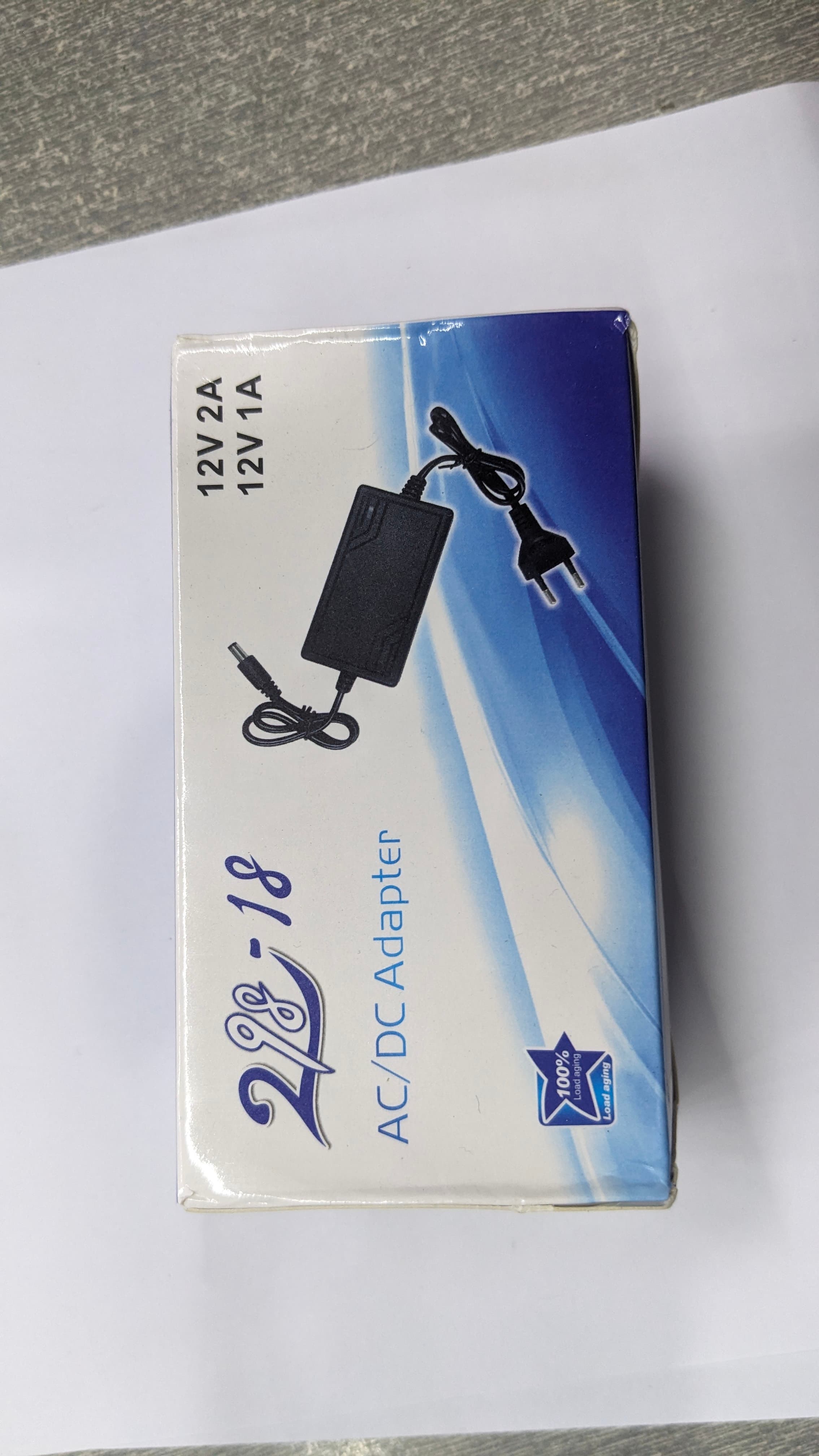 298-18 AC/DC Power Adapter (12V 2A) photo